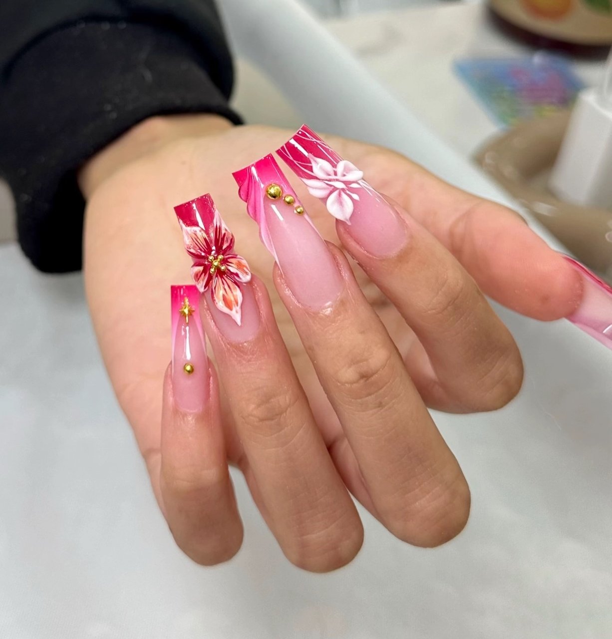 Pink French tips with 3D flowers