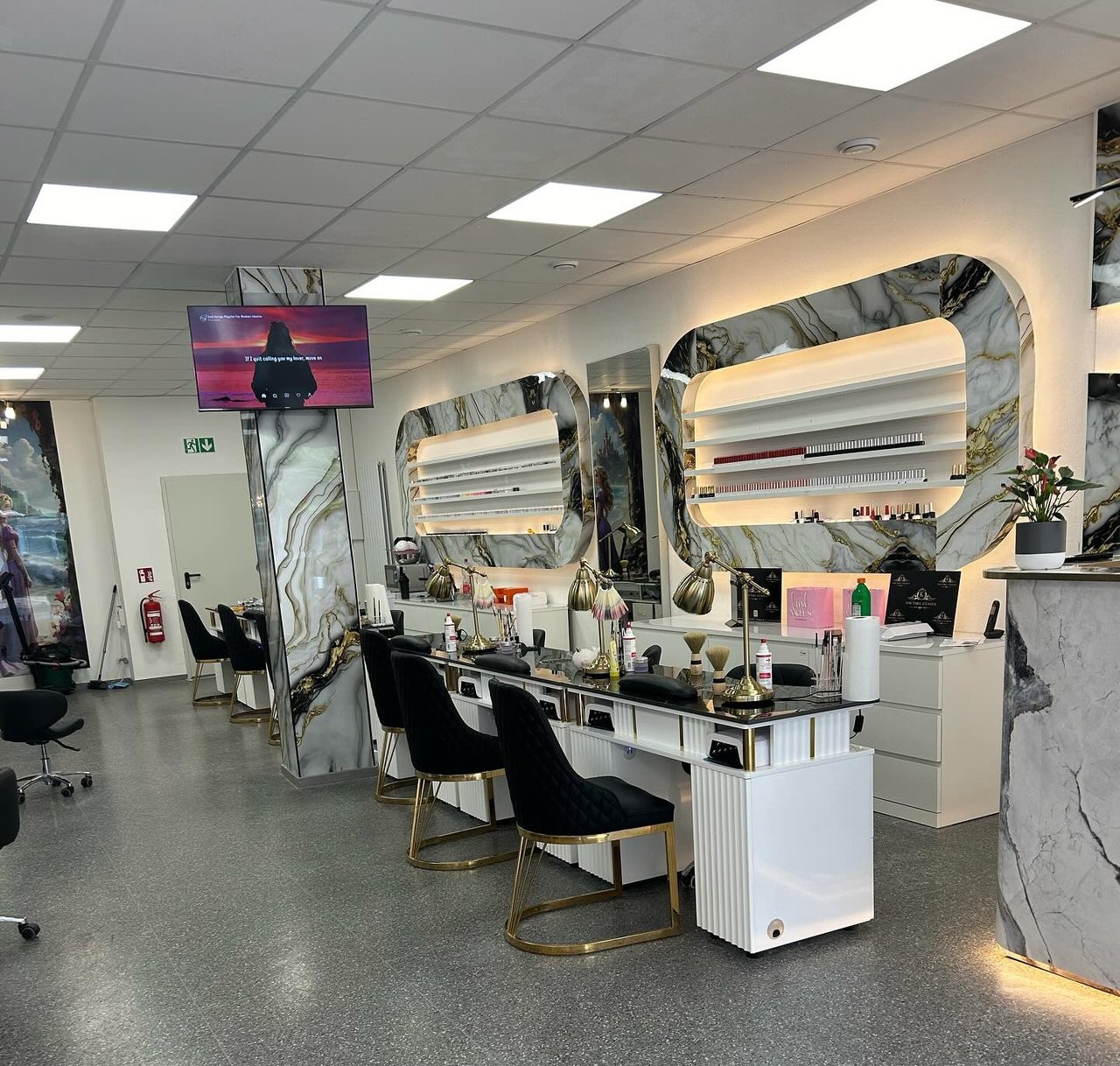 Manicure stations with marble & gold accents